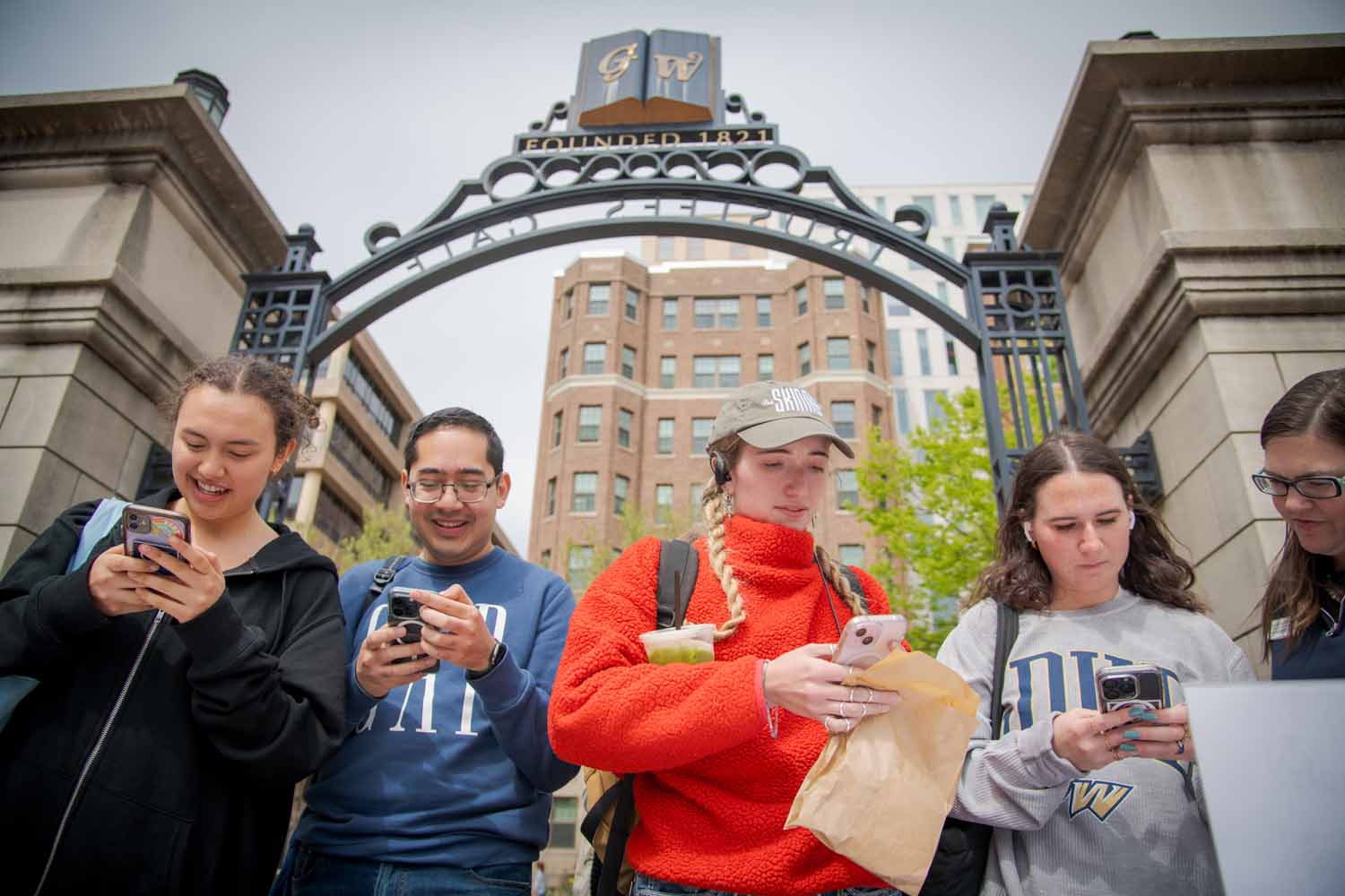 Students in front of a gate entrance to Kogan Plaza on Giving Day 2025